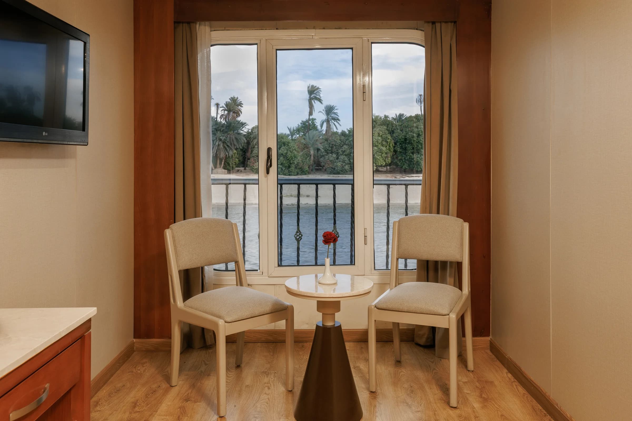 Cabin with a river-view balcony on the M/S Alma