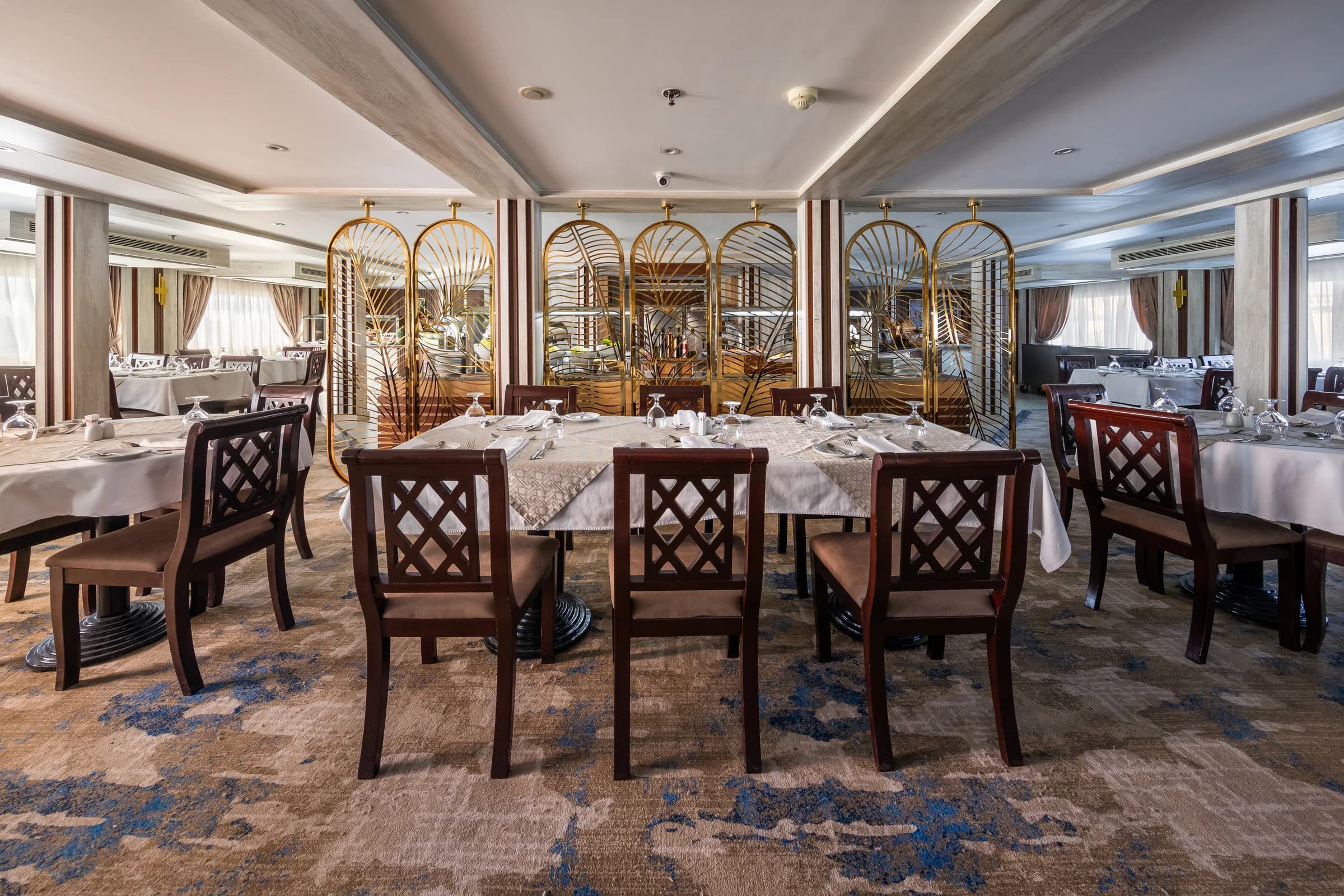 Dining room laid for service on the M/S Chateau Lafayette